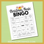 free christmas music bingo printable with hit songs like let it snow, frosty, winter wonderland, jingle bells.