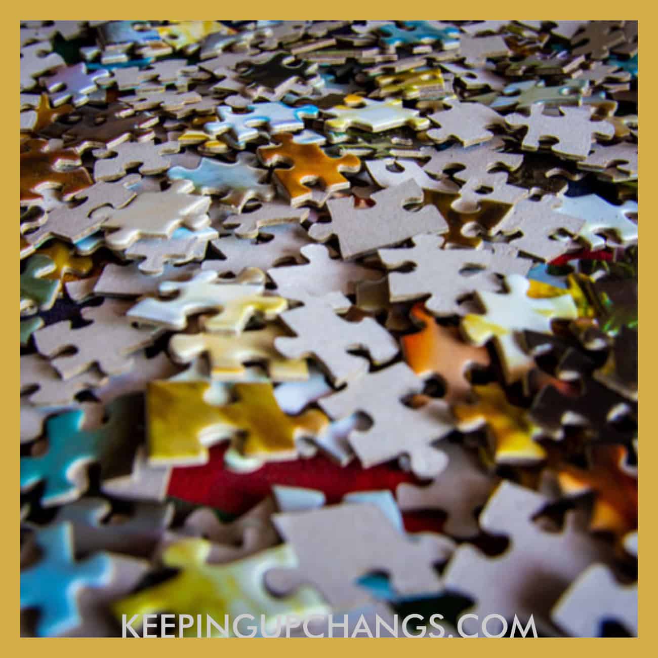 pile of jigsaw puzzle pieces.